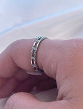 Load image into Gallery viewer, Bold angles and clean lines make up the entire body of this silver stackable ring. So the ring was designed to be adorned with three brilliant cut cubic zirconia, emanating the radiance and charming reflection of diamonds. Hand-polished to perfection, you will love wearing this ring on its own or stacking it with other pieces to make the look more unique. Material: 925 Sterling Silver, Cubic Zirconia Design: Rectangle Weight: 1.5g