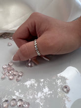 Load image into Gallery viewer, Adorable hearts linked together in a full circle make up the entire ring, creating a simple yet stunning silhouette. Hand-polished to perfection, you will love wearing this ring on its own or stacking it with other pieces to make the look more unique. Material: 925 Sterling Silver Design: Heart Weight: 1.4g