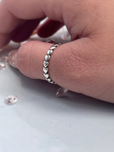 Load image into Gallery viewer, Adorable hearts linked together in a full circle make up the entire ring, creating a simple yet stunning silhouette. Hand-polished to perfection, you will love wearing this ring on its own or stacking it with other pieces to make the look more unique. Material: 925 Sterling Silver Design: Heart Weight: 1.4g