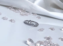 Load image into Gallery viewer, This silver love lettering stackable ring is the perfect engagement ring to offer to the one who holds your heart. Precious cubic zirconia stones adorn the ring, reflecting radiant light, making it more luxurious to the eyes. Material: 925 Sterling Silver, Cubic Zirconia Design: Love Weight: 1.4g