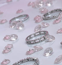 Load image into Gallery viewer, Bold angles and clean lines make up the entire body of this silver stackable ring. So the ring was designed to be adorned with three brilliant cut cubic zirconia, emanating the radiance and charming reflection of diamonds. Hand-polished to perfection, you will love wearing this ring on its own or stacking it with other pieces to make the look more unique. Material: 925 Sterling Silver, Cubic Zirconia Design: Rectangle Weight: 1.5g