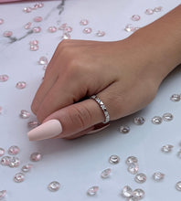 Load image into Gallery viewer, Alternating hearts form this exquisite silver ring, highlighting an everlasting bond rooted in love and admiration. Hand-polished to perfection, you will love wearing this ring on its own or stacking it with other pieces to make the look more unique. Material: 925 Sterling Silver, Cubic Zirconia Design: Heart Weight: 1.4g