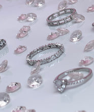 Load image into Gallery viewer, Alternating hearts form this exquisite silver ring, highlighting an everlasting bond rooted in love and admiration. Hand-polished to perfection, you will love wearing this ring on its own or stacking it with other pieces to make the look more unique. Material: 925 Sterling Silver, Cubic Zirconia Design: Heart Weight: 1.4g