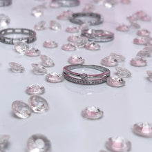 Load image into Gallery viewer, Symbolizing the duality of a silver ring, this double line ring features two contrasting lines that give off a unique yet familiar aura.. Further enhancing this idea is the head connecting both lines with a large round brilliant cubic zirconia.Material: 925 Sterling Silver, Cubic Zirconia Design: Round Weight: 1.9g