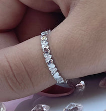Load image into Gallery viewer, Alternating hearts form this exquisite silver ring, highlighting an everlasting bond rooted in love and admiration. Hand-polished to perfection, you will love wearing this ring on its own or stacking it with other pieces to make the look more unique. Material: 925 Sterling Silver, Cubic Zirconia Design: Heart Weight: 1.4g