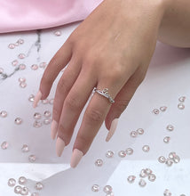 Load image into Gallery viewer, This silver love lettering stackable ring is the perfect engagement ring to offer to the one who holds your heart. Precious cubic zirconia stones adorn the ring, reflecting radiant light, making it more luxurious to the eyes. Material: 925 Sterling Silver, Cubic Zirconia Design: Love Weight: 1.4g