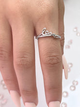 Load image into Gallery viewer, This silver love lettering stackable ring is the perfect engagement ring to offer to the one who holds your heart. Precious cubic zirconia stones adorn the ring, reflecting radiant light, making it more luxurious to the eyes. Material: 925 Sterling Silver, Cubic Zirconia Design: Love Weight: 1.4g