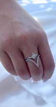 Load image into Gallery viewer,  The radiant cubic zirconia stones that adorn the head of the ring transforms it into a luxurious piece of accessory any woman will want on their finger. Hand-polished to perfection, you will love wearing this ring on its own or stacking it with other pieces to make the look more unique.  Material: 925 Sterling Silver, Cubic Zirconia  Design: Star  Weight: 1.0g
